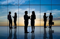 Corporate personnel in airport waiting for limousine