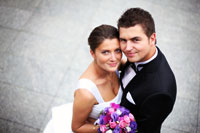 Wedding couple posing for camera
